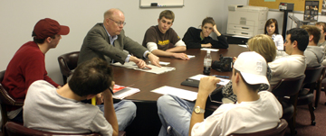 Bill Elsen discusses that day's edition with the editorial board of the Technician. Elsen, a former editor with The Washington Post, came in the first week of school in the spring semester to work with reporters and other staff members of the Technician, Agromeck and Nubian Message.