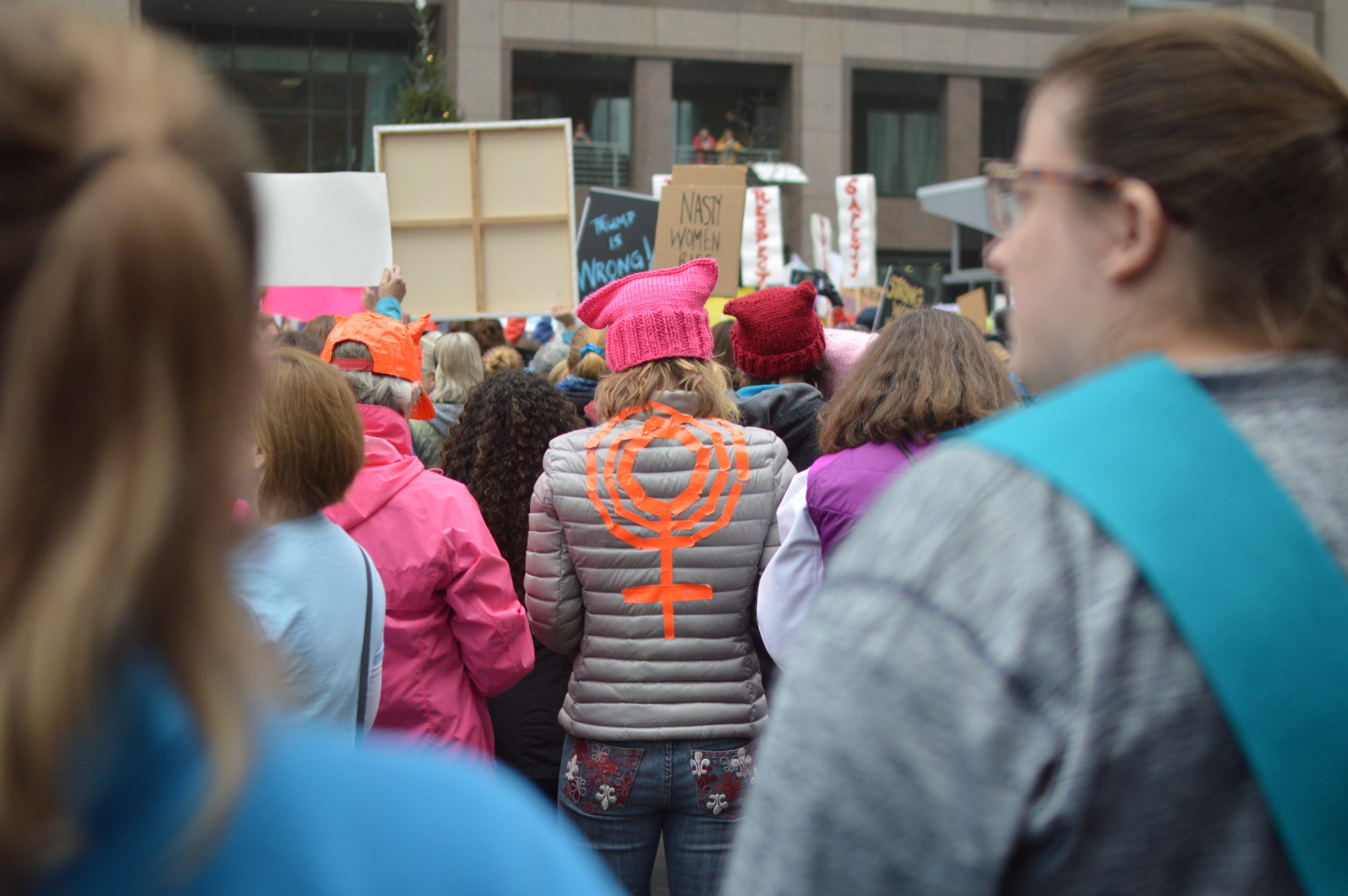 A protestor displays the female solidarity symbol in duct tape on the back of her jacket at the Women's March on Raleigh on Sat., Jan. 21, 2017. The Women's March on Raleigh was a Sister March to the Women's March on Washington. An estimated 17,000 people were in attendance at the march in Raleigh, coinciding with 673 Women's Marches in solidarity with the march on Washington and an estimated 2,587,190 marchers worldwide (Source: The Action Network).